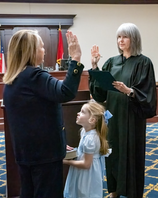 Judge Jennifer Nichols; her granddaughter, Ann Campbell Boulki and Chief Justice Holly Kirby