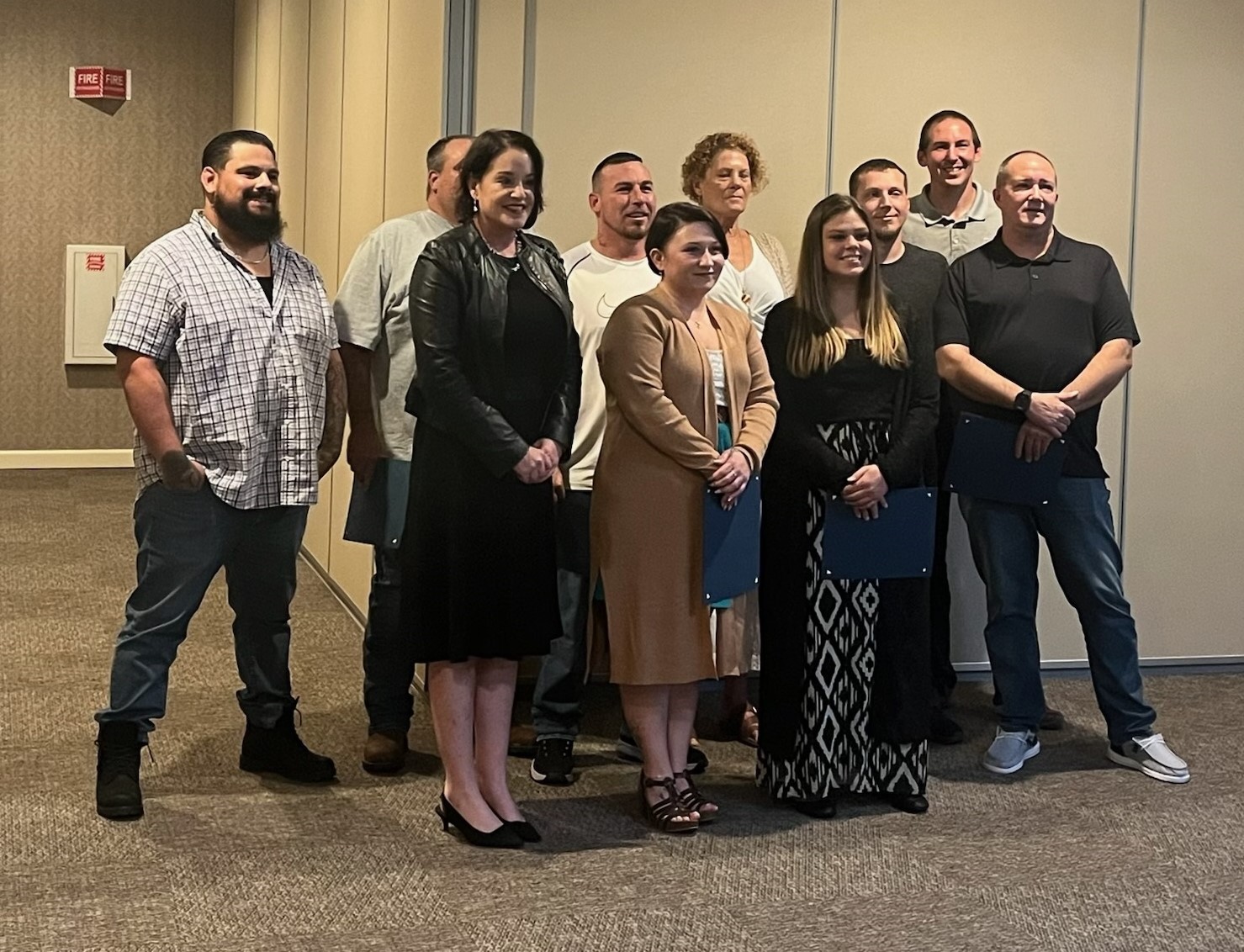 October 2023 Recovery Court graduates pictured with Judge Boniface (front row, left) and Case Manager, David Georges (back row, right).