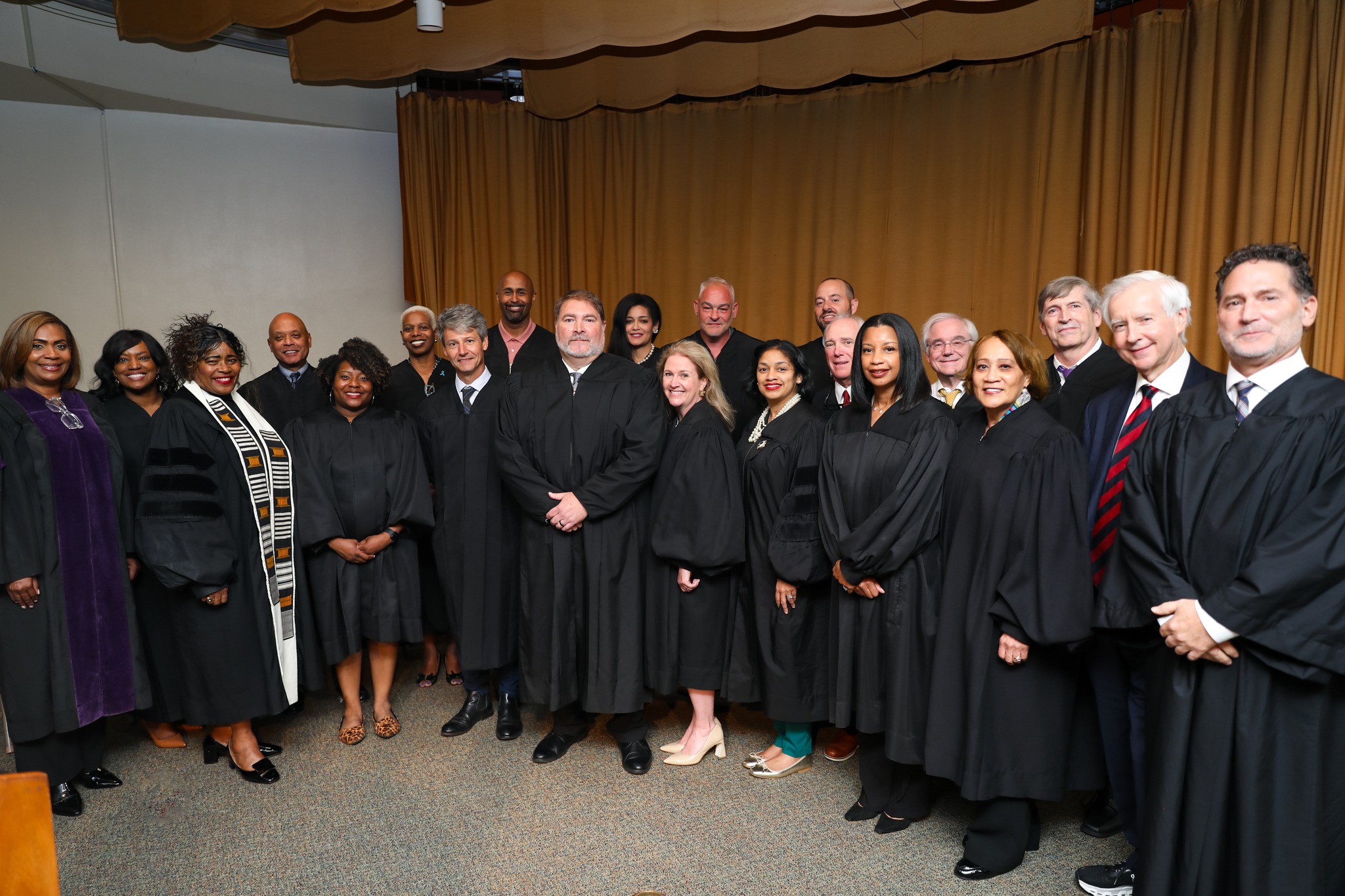 Judges gather for a photo at Judge Lepone's swearing in ceremony.