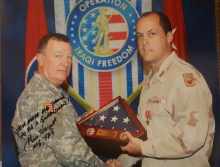 Judge L. Craig Johnson receives the Bronze Star for his 2005 deployment to Iraq